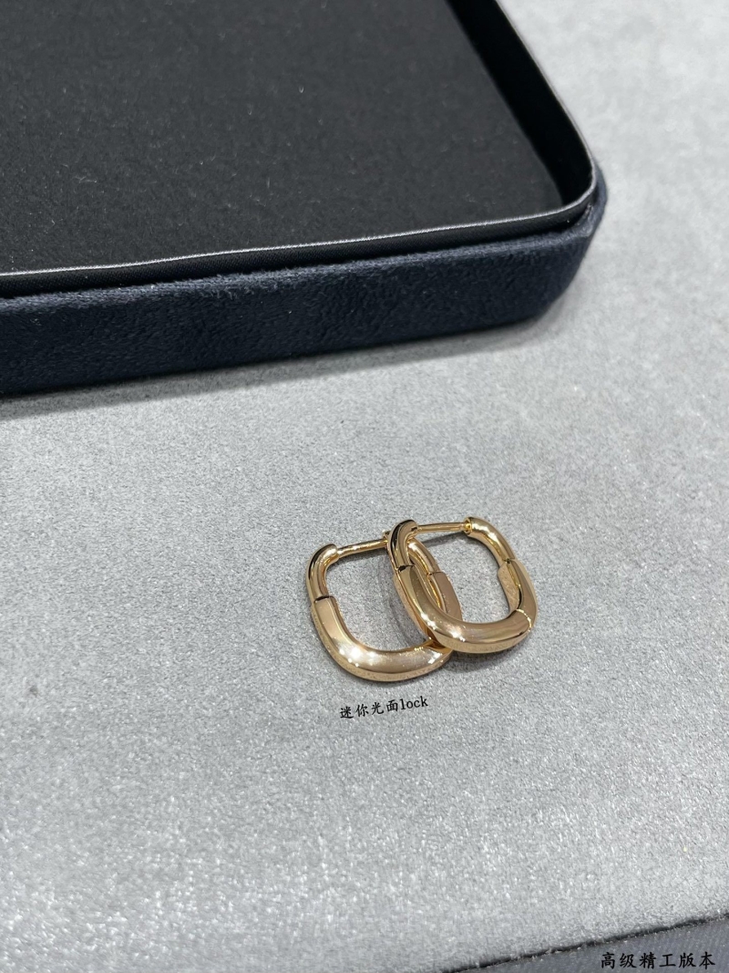 T*f*ny earrings